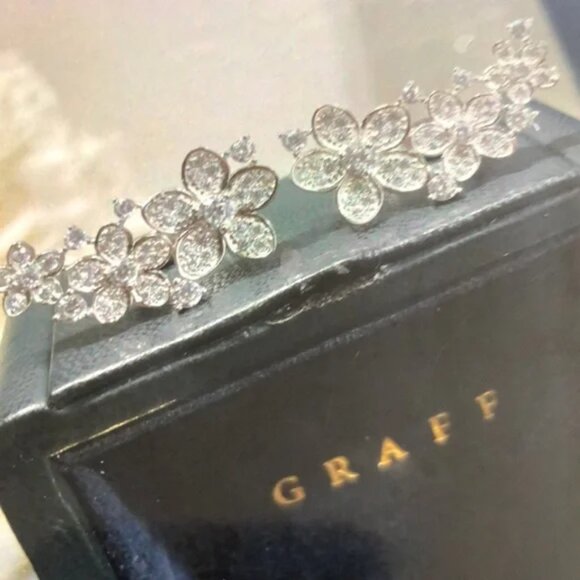 PAIR OF SAPPHIRE AND DIAMOND  Graff Floral Earrings